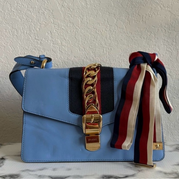 Gucci Handbags - Gucci Sylvie Light Blue Crossbody Bag with Red and Gold Details